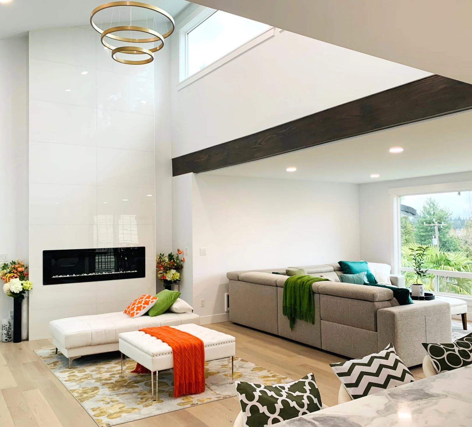Modern living room with stone fireplace and built-ins